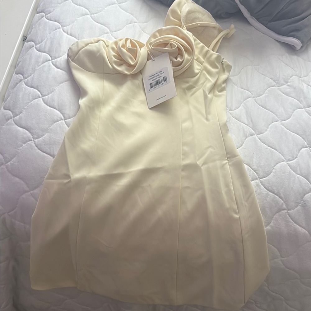 Elegant Cream Dress with Floral Detail
